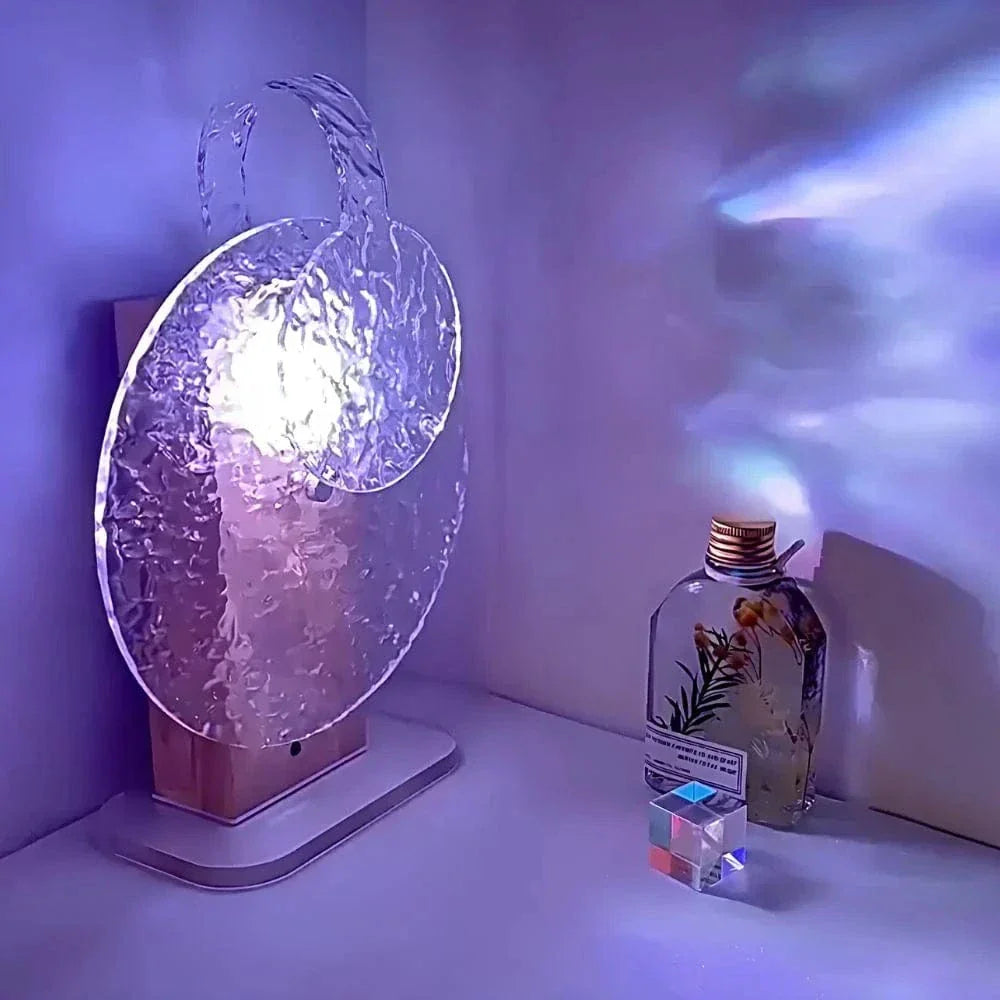 "Rechargeable LED lamp projects sunset hues, ocean waves; adds cozy ambiance to home decor with adjustable head."