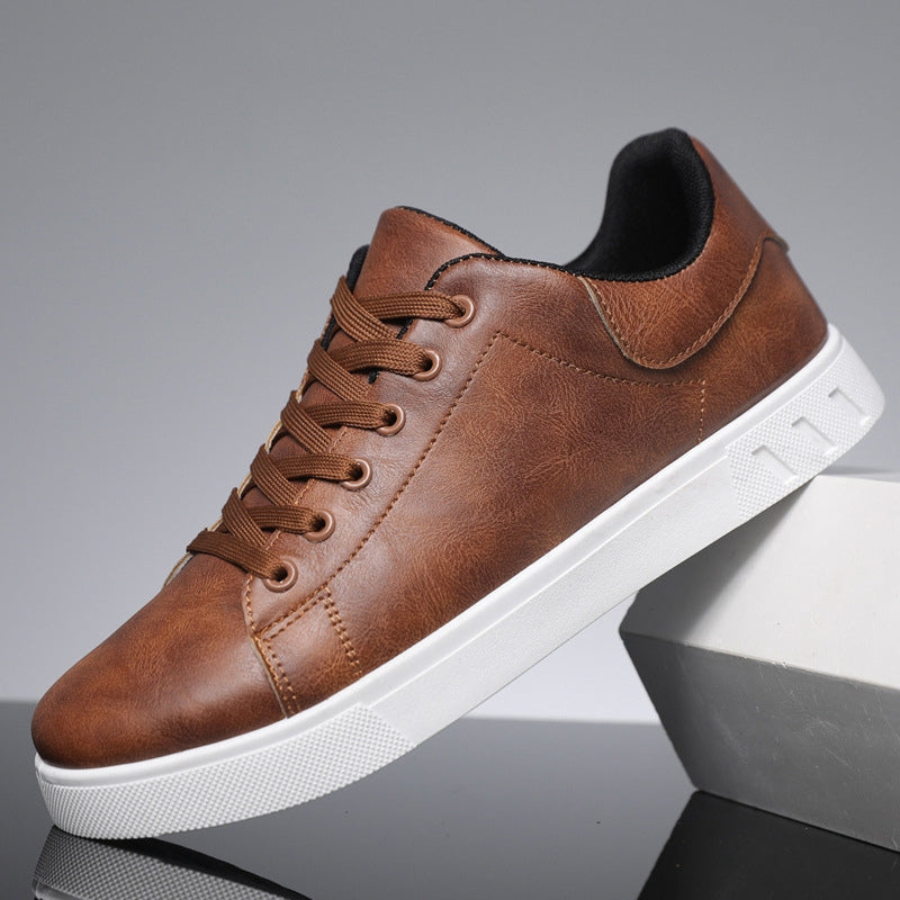 Sleek men's stylish leather sneakers side view, showcasing premium quality and modern design for versatile, casual chic wear.