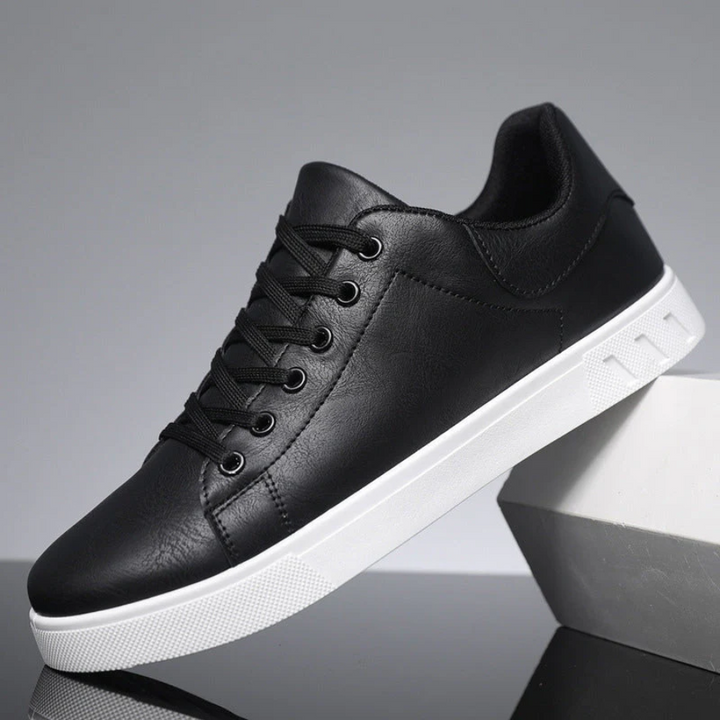 Sleek men's stylish leather sneakers side view, showcasing premium quality and modern design for versatile, casual chic wear.