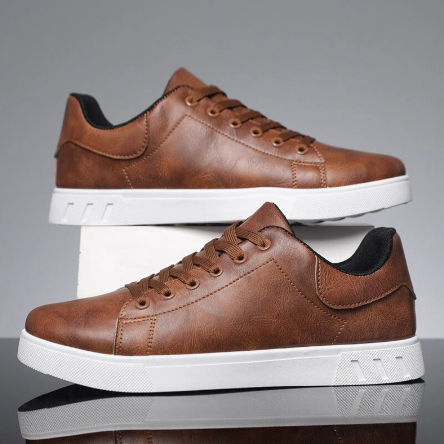 Sleek men's stylish leather sneakers side view, showcasing premium quality and modern design for versatile, casual chic wear.