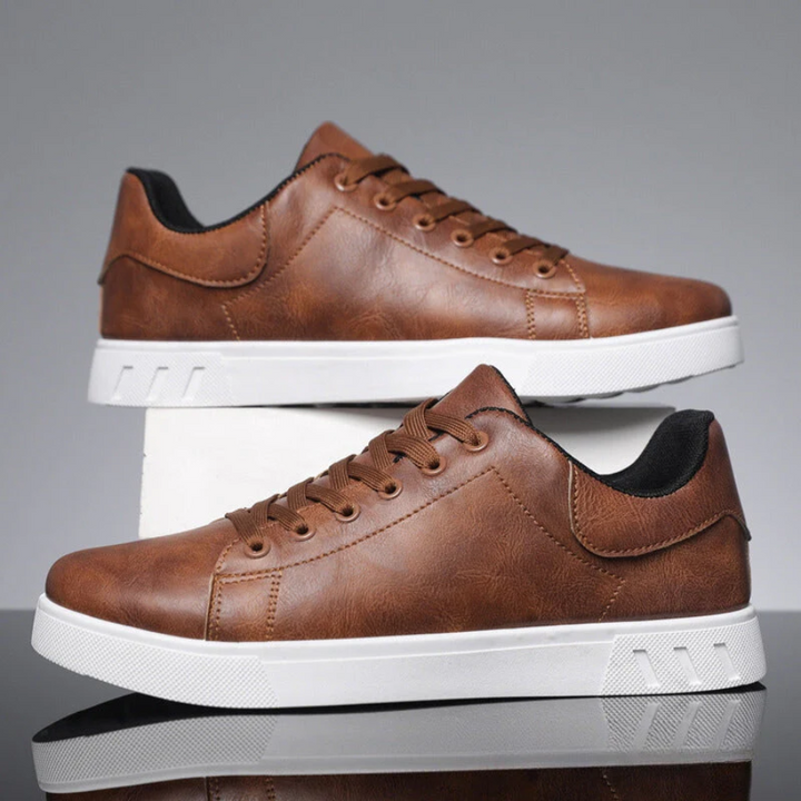 Sleek men's stylish leather sneakers side view, showcasing premium quality and modern design for versatile, casual chic wear.