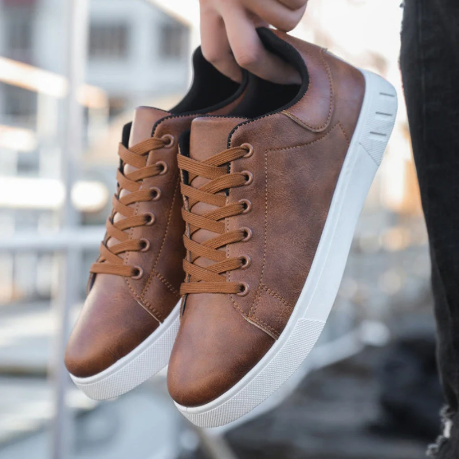 Sleek men's stylish leather sneakers side view, showcasing premium quality and modern design for versatile, casual chic wear.