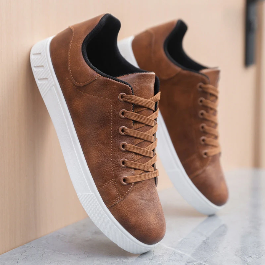 Sleek men's stylish leather sneakers side view, showcasing premium quality and modern design for versatile, casual chic wear.
