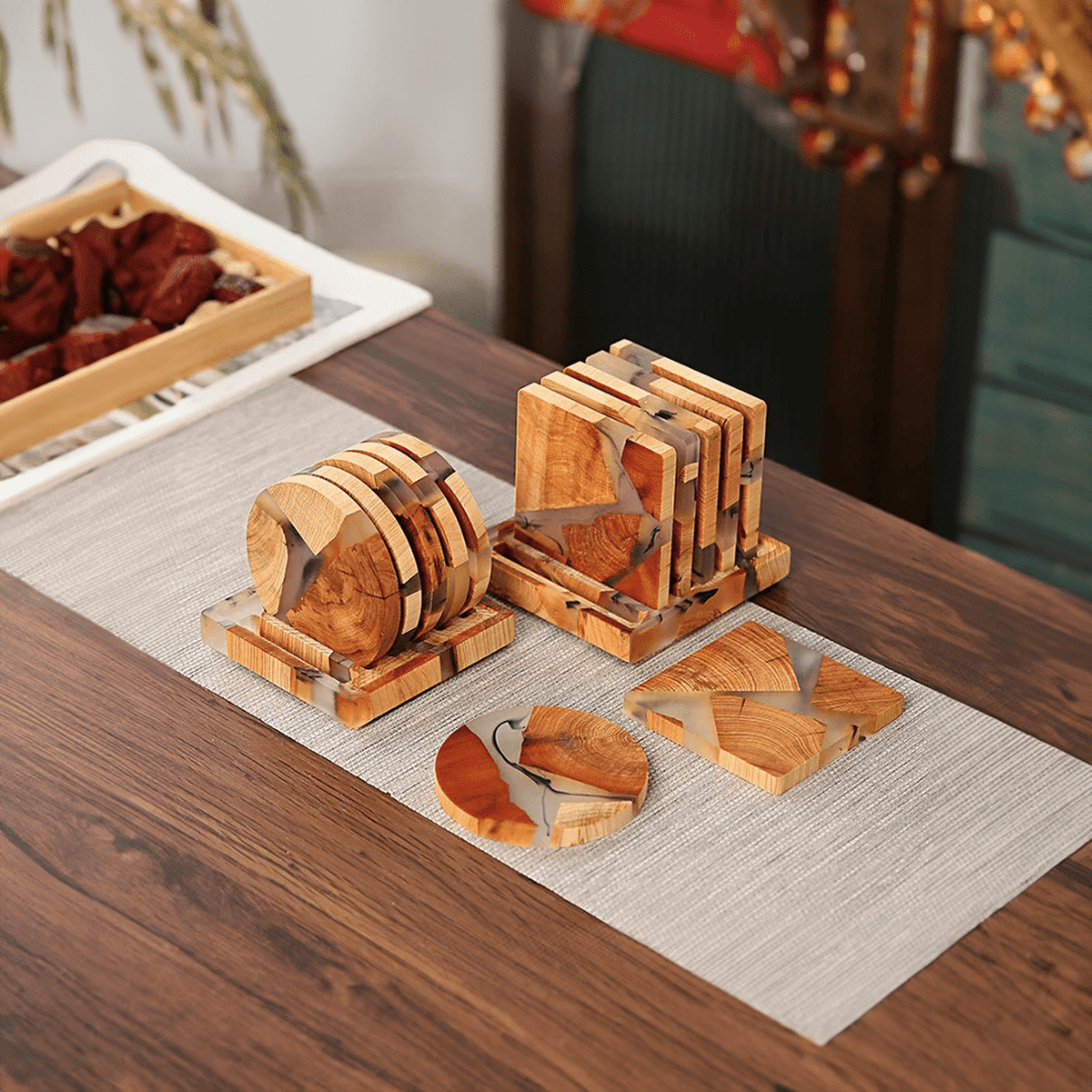 "Solid wood coasters with Japanese design, featuring natural tones and vibrant resin accents, perfect for table protection."
