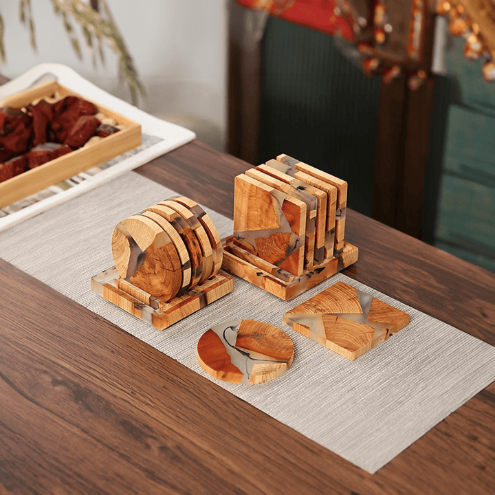 "Solid wood coasters with Japanese design, featuring natural tones and vibrant resin accents, perfect for table protection."