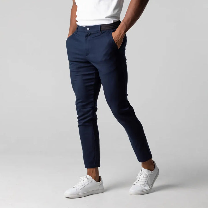 "Stylish men's slim-fit trousers in grey and marine blue, featuring a sleek, tailored design for a modern, elegant look."