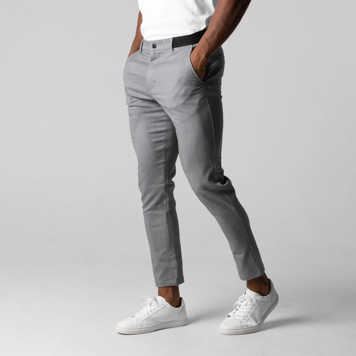 "Stylish men's slim-fit trousers in grey and marine blue, featuring a sleek, tailored design for a modern, elegant look."