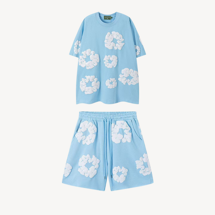 Unisex cotton floral tee and shorts set, bold floral print, soft fabric, casual wear, versatile unisex design, relaxed fit.