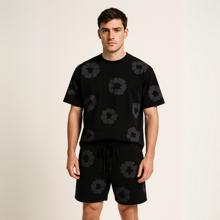 Unisex cotton wreath summer set with black base and white floral print; T-shirt and shorts ensemble for stylish comfort.
