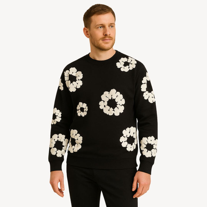 "Unisex floral cotton sweatshirt with vibrant floral pattern, crew neck, and long sleeves in black for casual style."