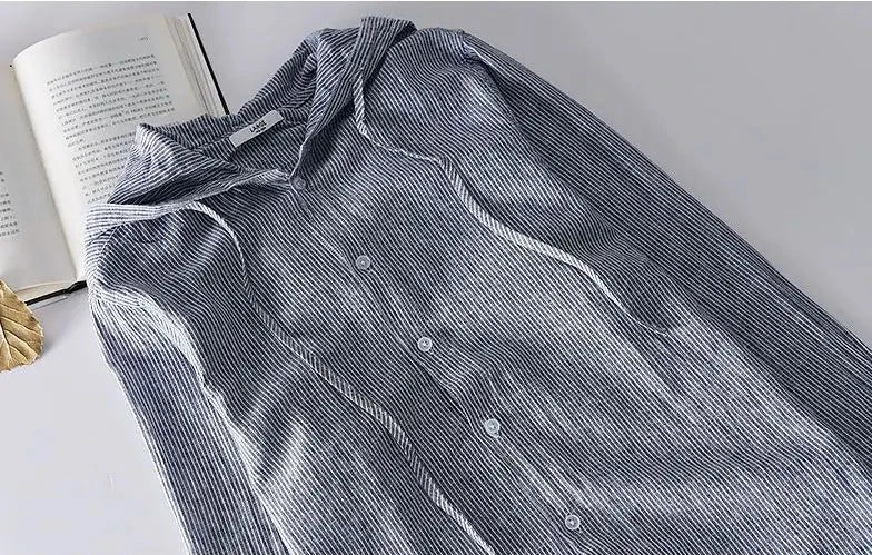 Unisex hooded shirt in lightweight fabric, showcasing breathable material and casual design with versatile unisex fit.