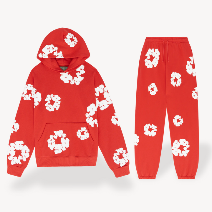 Unisex hoodie with bold white floral graphics on black cotton, combines style and comfort for a standout look.