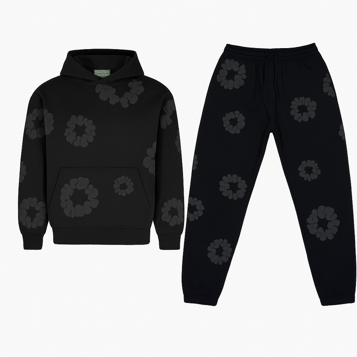 Unisex hoodie with bold white floral graphics on black cotton, combines style and comfort for a standout look.