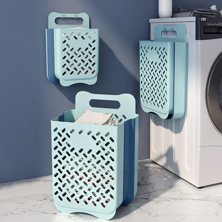 "Wall-mounted foldable laundry basket with breathable mesh design, shown unfolded and mounted on a wall for space-saving use.