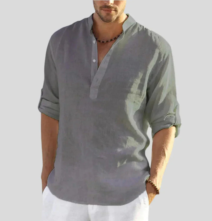 White men's lightweight cotton half-button shirt, relaxed fit. Perfect casual staple for warmer days, breathable and stylish.