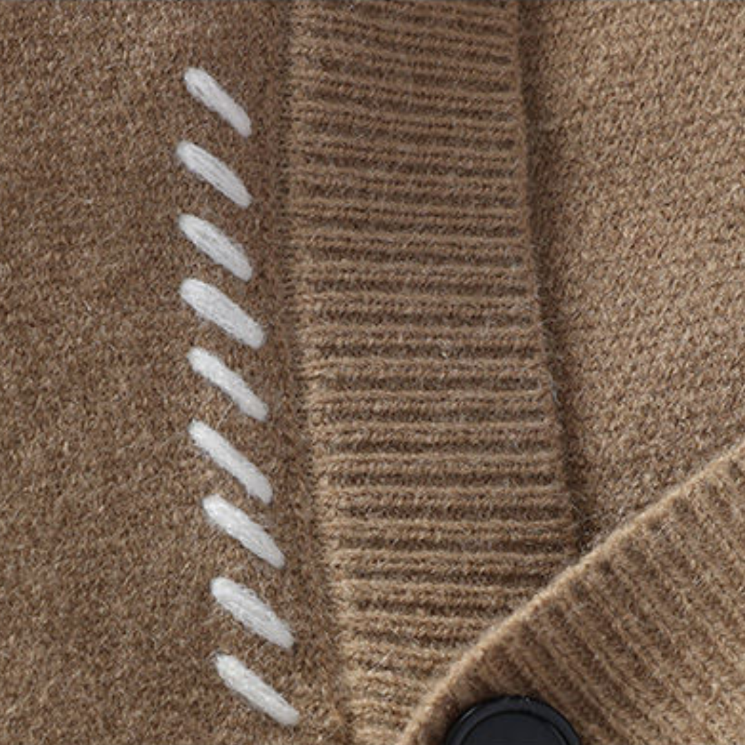 "White men's wool cardigan sweater with button-up front, ribbed cuffs, and black stitch detail for stylish winter wear."