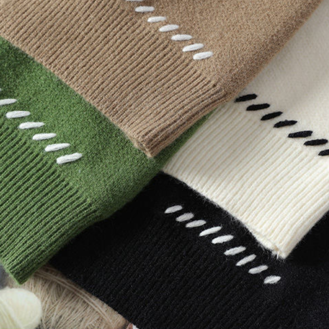 "White men's wool cardigan sweater with button-up front, ribbed cuffs, and black stitch detail for stylish winter wear."