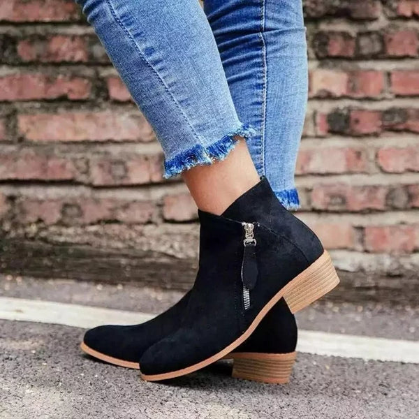 "Women's ankle length orthopedic boots with zipper, modern style, available in multiple colors for comfort and support."