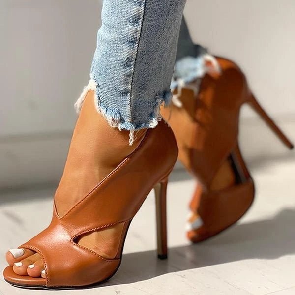 "Women's black & brown open-toe stiletto heels with side cutouts, peep-toe design, sleek silhouette, and slip-on style."