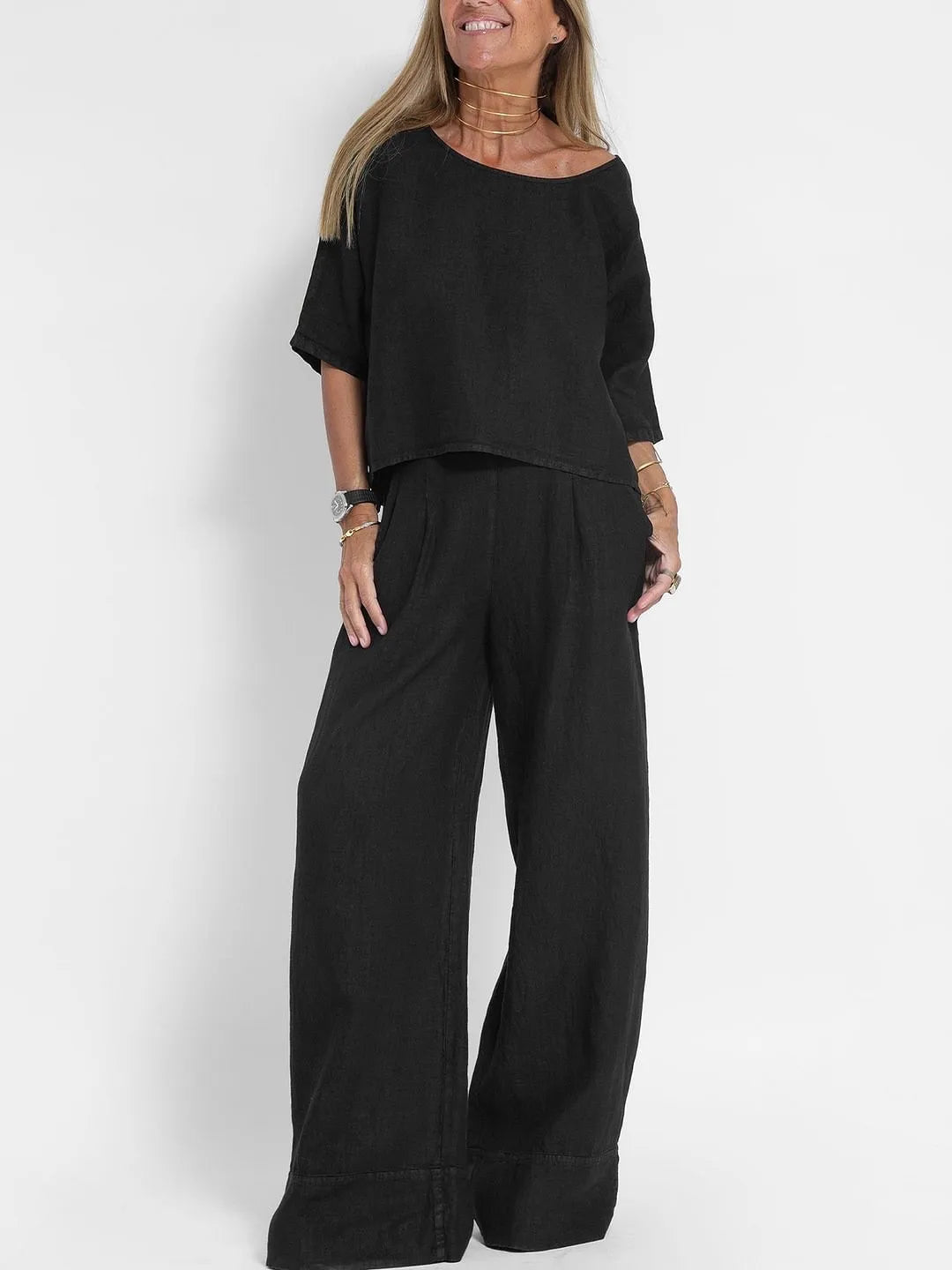Women's casual outfit set with chic top and matching pants, light formal style, ideal for versatile and stylish wear.