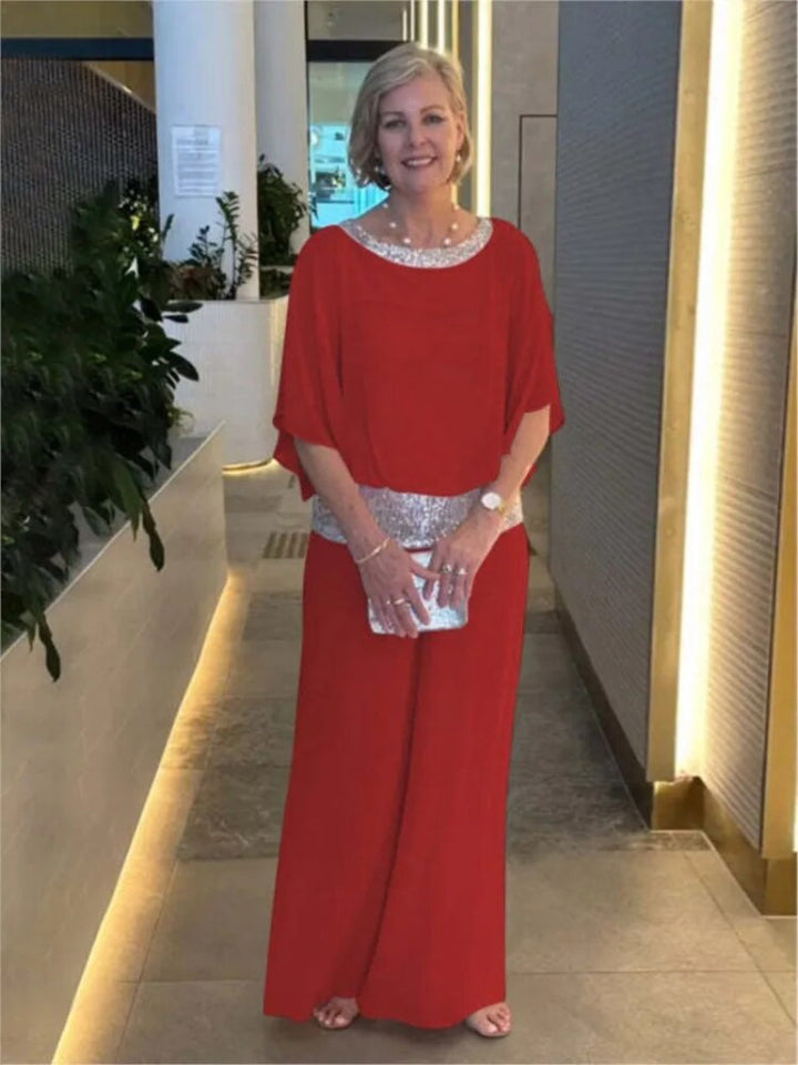 "Women's elegant chiffon set with sequin accents, featuring batwing-sleeve blouse and versatile wide-leg trousers."