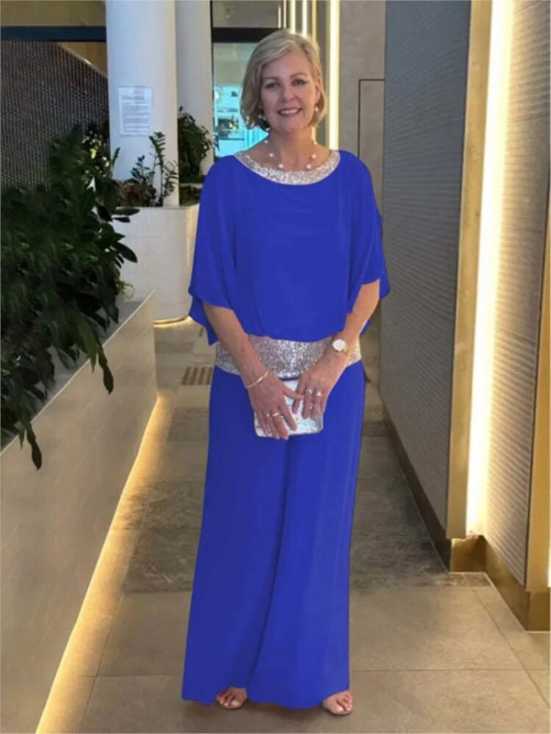 "Women's elegant chiffon set with sequin accents, featuring batwing-sleeve blouse and versatile wide-leg trousers."