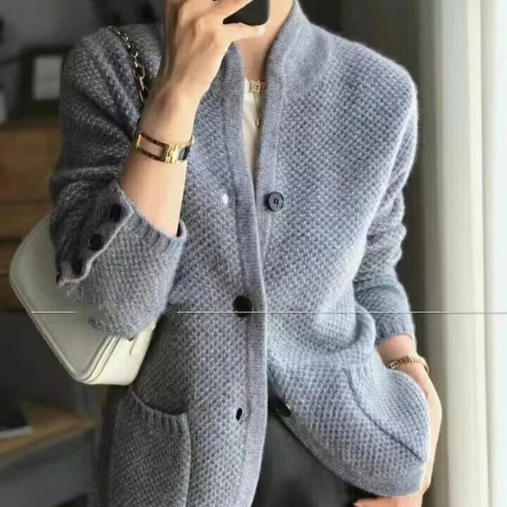 Women's knitted wool cardigan jacket, button-up sweater, elegant design, available in beige, brown, or grey colors.