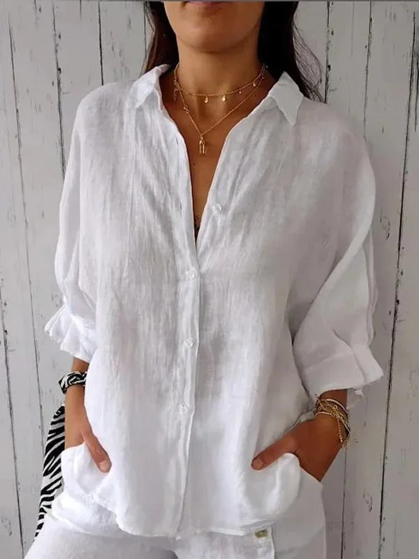 Women's linen button-up shirt, casual and breathable, lightweight fabric, relaxed fit, roll-up sleeves, versatile look.