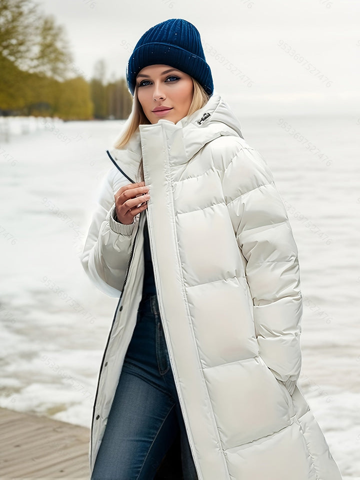 Women's long down coat with hood for autumn/winter; solid pattern, padded for warmth, chic and versatile style.