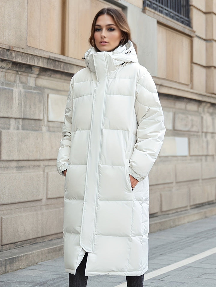 Women's long down coat with hood for autumn/winter; solid pattern, padded for warmth, chic and versatile style.