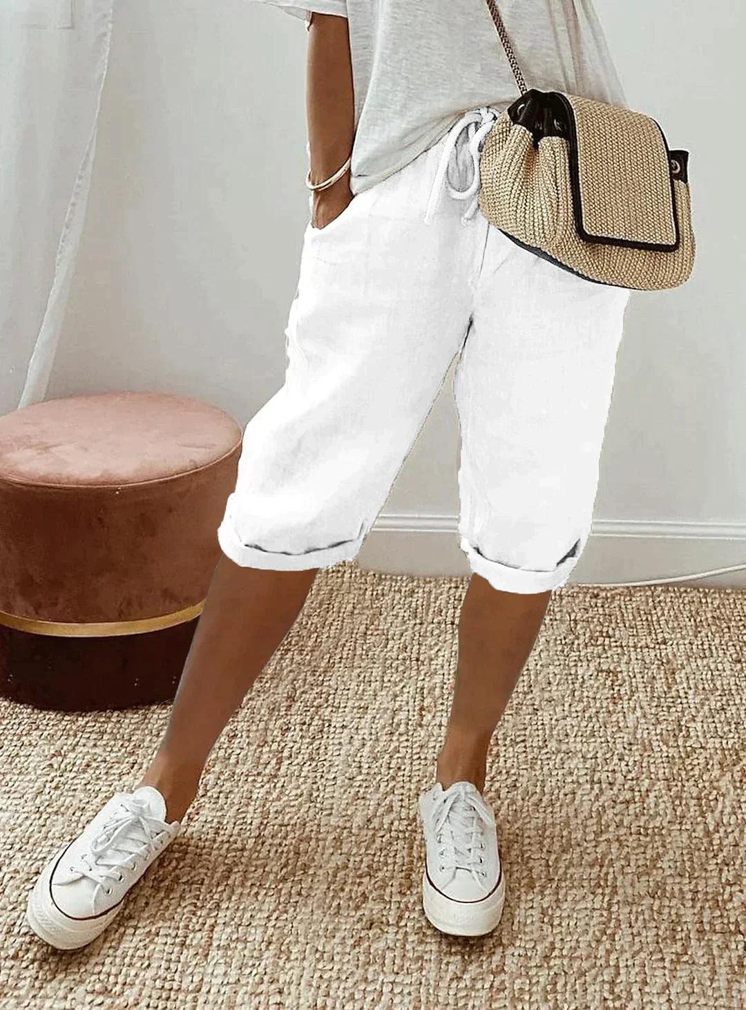Women's loose-fit linen capri pants, front view showcasing breezy, relaxed design for casual summer style and comfort.
