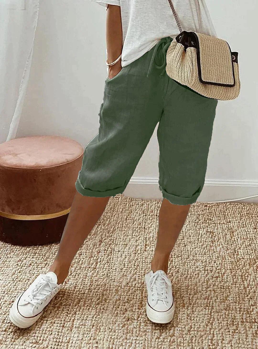 Women's loose-fit linen capri pants, front view showcasing breezy, relaxed design for casual summer style and comfort.