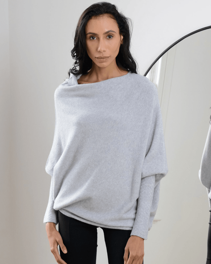 "Womens loose sweater with classic design, luxurious fit; available in beige, gray, black, green, purple, and more colors."