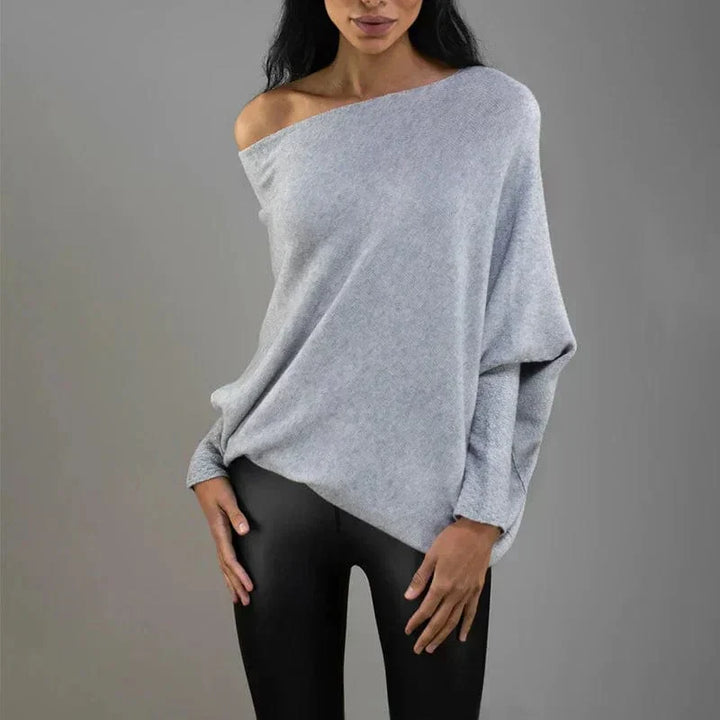 "Womens loose sweater with classic design, luxurious fit; available in beige, gray, black, green, purple, and more colors."