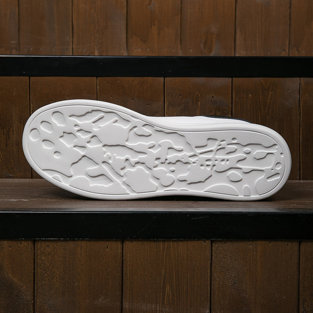 "Women's minimalist white leather sneakers with sleek design and cushioned soles, ideal for casual wear and comfort."