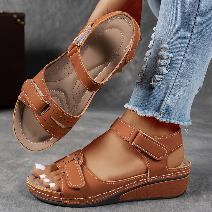 Women's orthopedic comfort sandals, adjustable straps, cushioned insoles, versatile colors, stylish footwear.