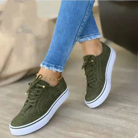 Women's orthopedic lace-up sneakers showcasing ergonomic insole, synthetic upper, and versatile colors for comfort and style.