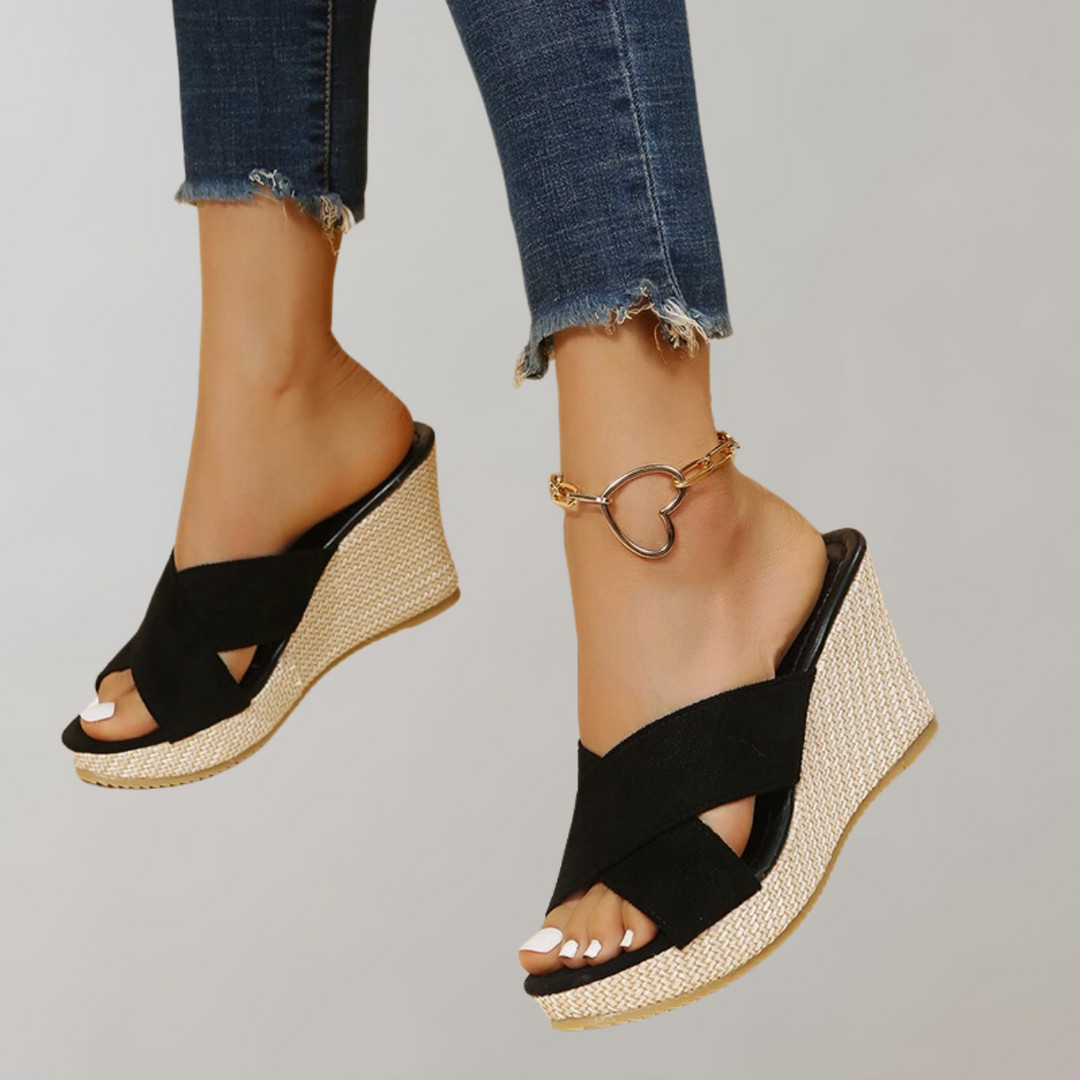 "Women's orthopedic wedge sandals with chic crisscross straps, cushioned arch support, and supportive wedge design."