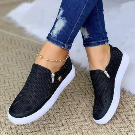 Women's orthopedic zip-up shoes, supportive design, black, gold, white, casual footwear for all-day comfort and stability.