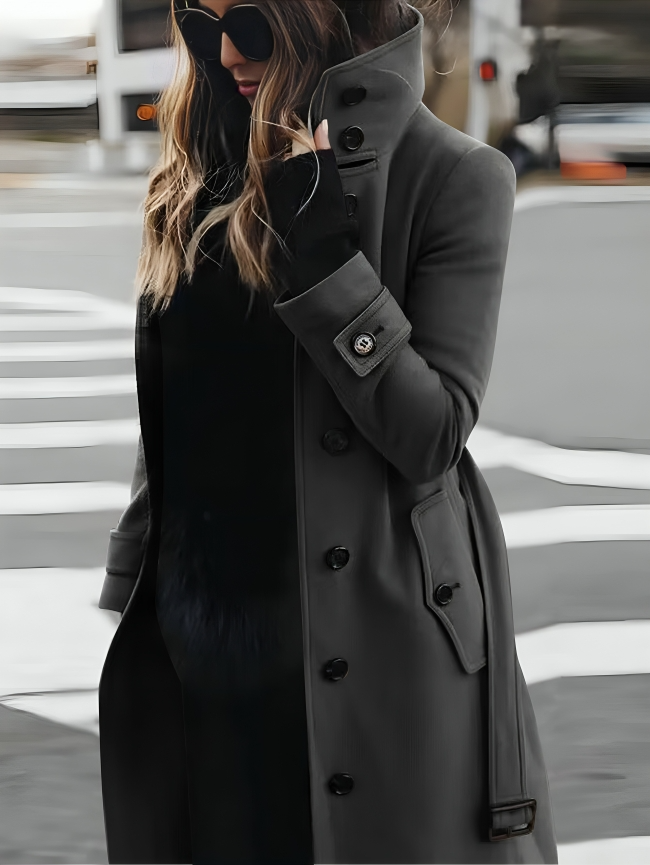 Women's slim-fit wool winter coat with long sleeves, showcasing sleek design; ideal for casual and formal settings.