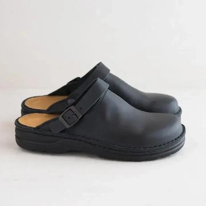 "Women's Slip-On Leather Mules, side view; minimalist design, luxury leather finish, comfortable fit for style and ease."