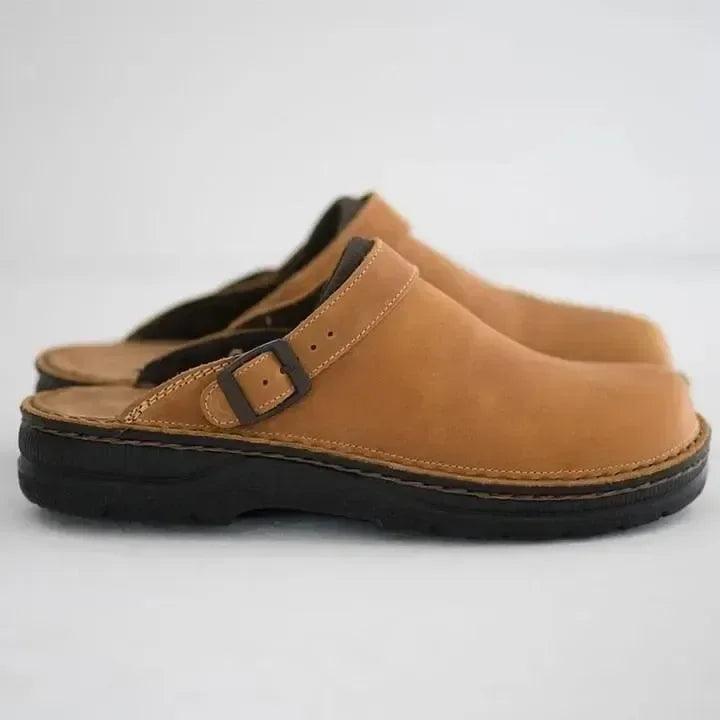 "Women's Slip-On Leather Mules, side view; minimalist design, luxury leather finish, comfortable fit for style and ease."