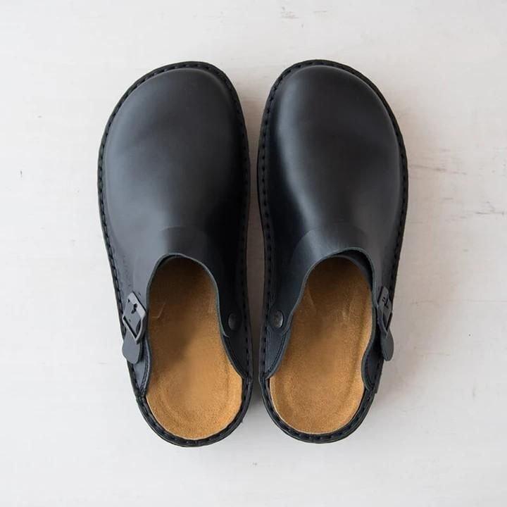 "Women's Slip-On Leather Mules, side view; minimalist design, luxury leather finish, comfortable fit for style and ease."