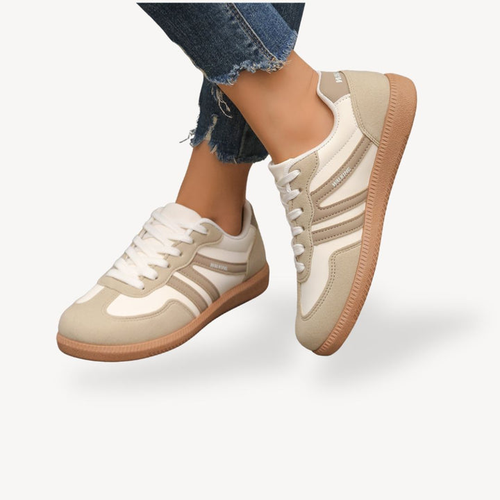 "Women's suede orthopedic sneakers with contrast color, soft suede panels, lace-up closure for comfort and style."
