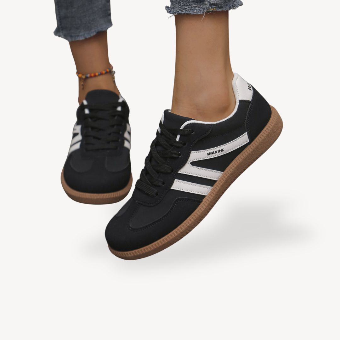 "Women's suede orthopedic sneakers with contrast color, soft suede panels, lace-up closure for comfort and style."