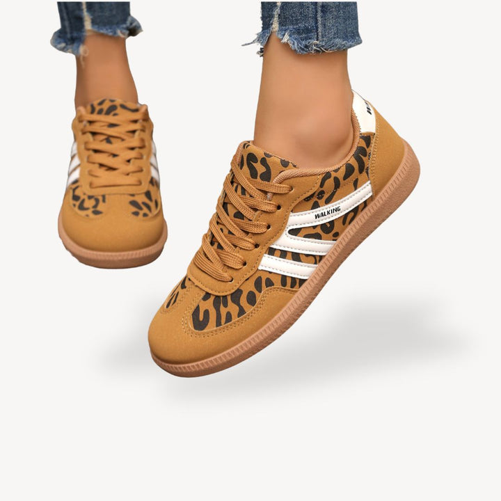 "Women's suede orthopedic sneakers with contrast color, soft suede panels, lace-up closure for comfort and style."