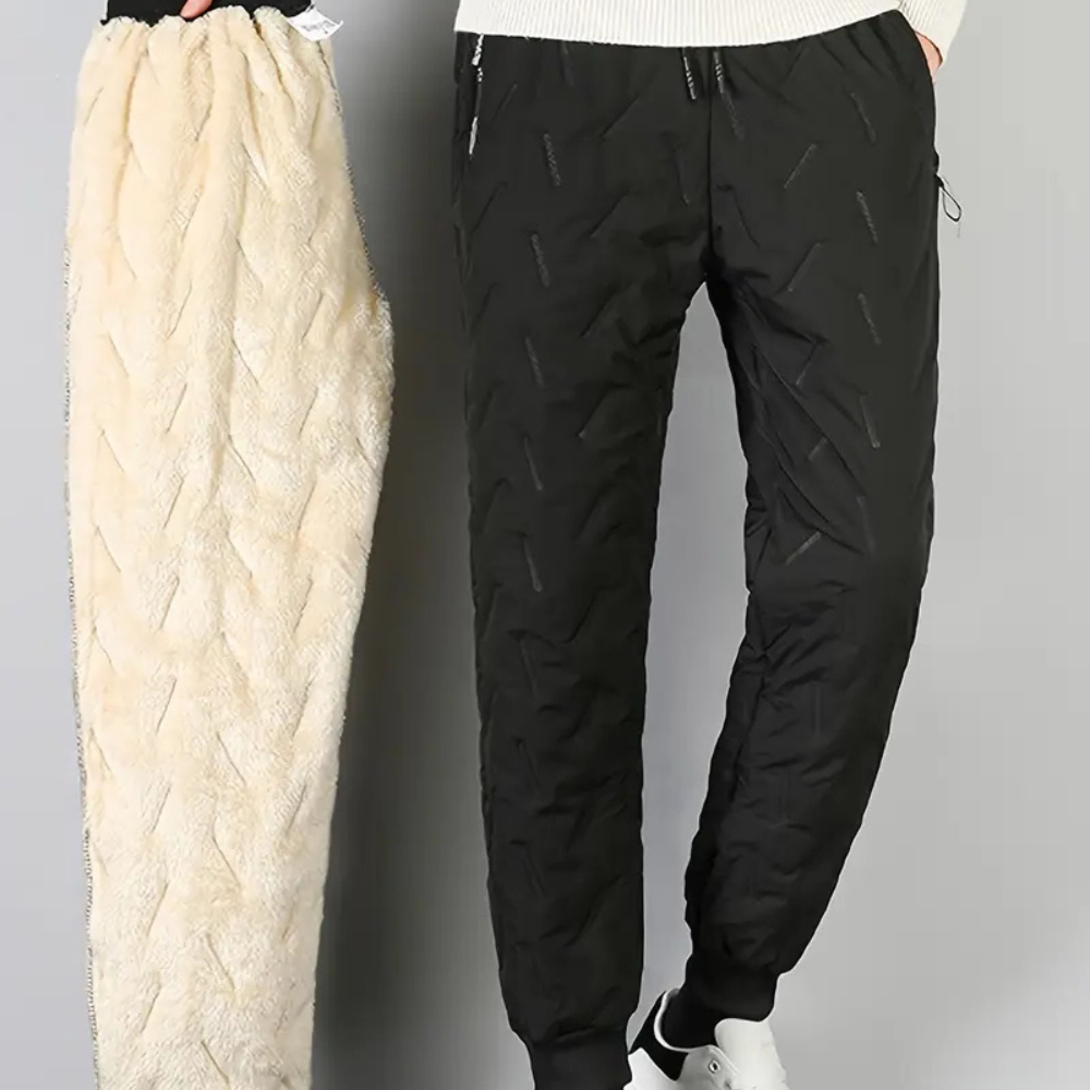 Women's thermal waterproof fleece-lined trousers, black, fleece interior, zippered pockets, ideal winter outdoor wear.