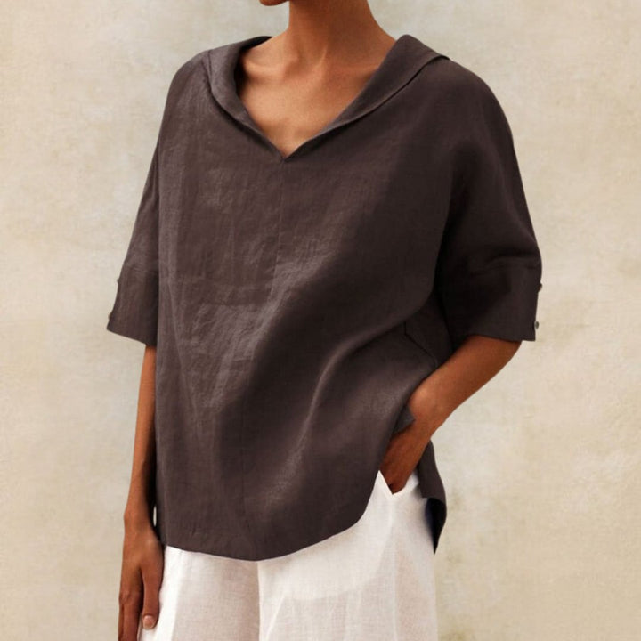 Women's V-neck casual linen shirt with relaxed fit, classic design, lightweight fabric, perfect for versatile styling.