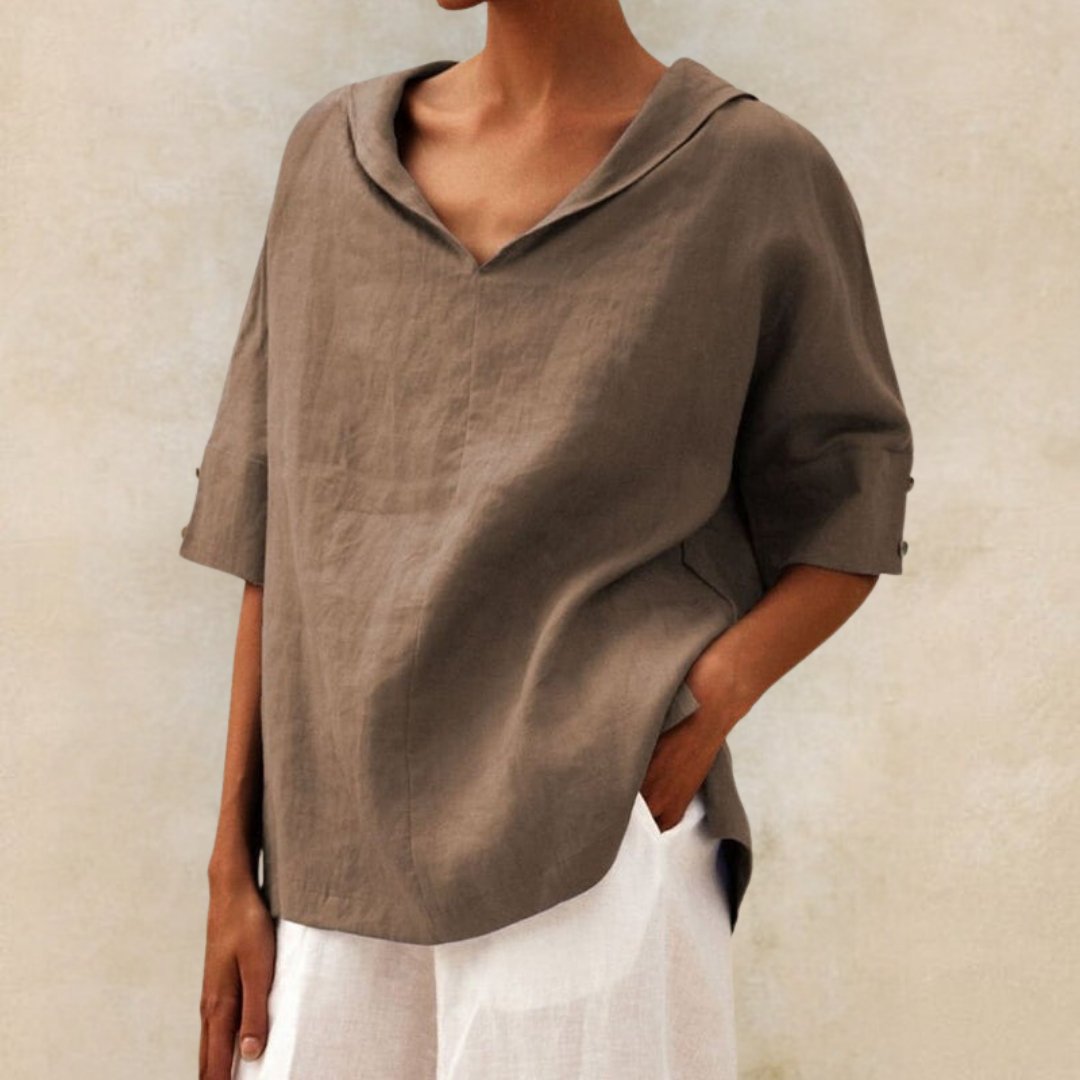 Women's V-neck casual linen shirt with relaxed fit, classic design, lightweight fabric, perfect for versatile styling.