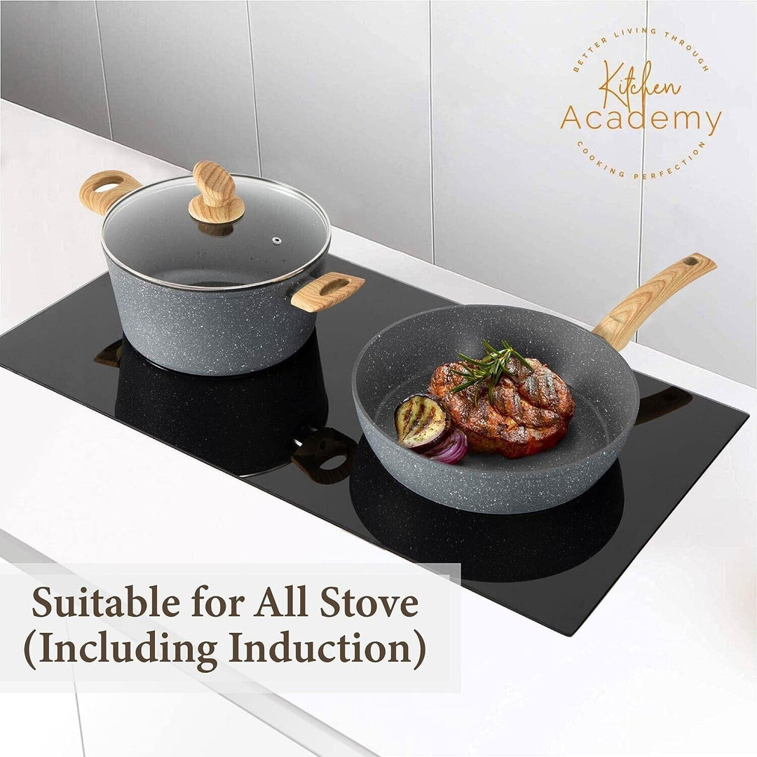 "12-piece granite coated nonstick cookware set with glass lids and ergonomic handles, perfect for versatile kitchen cooking."